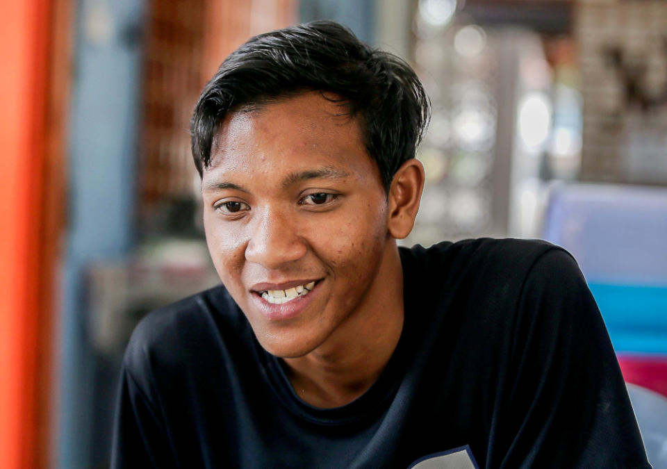 The mushroom cultivation programme for special students has given Abdul Muin Rosli a reason to be at school early. — Picture by Farhan Najib