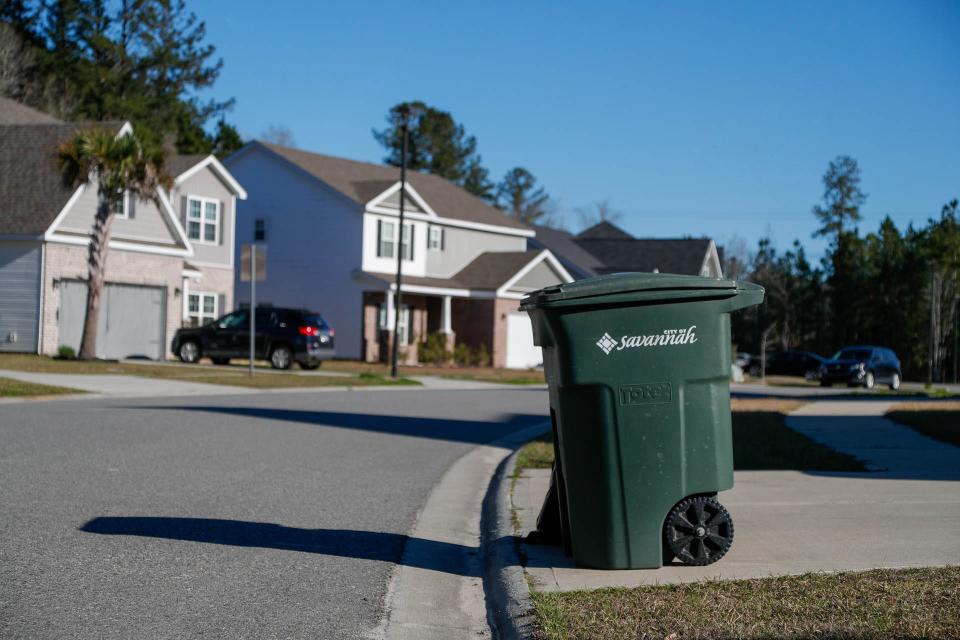 A City of Savannah trash can sits at the curb in The Palms neighborhood, a development in the Savannah City limits off of Highgate Boulevard.
