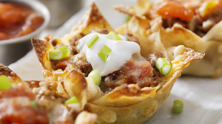 Mini taco cups with ingredients