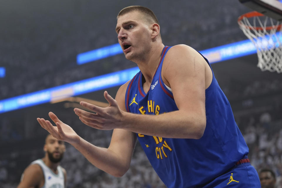 Denver Nuggets center Nikola Jokic reacts toward a referee during the first half of Game 6 of the team's NBA basketball second-round playoff series against the Minnesota Timberwolves, Thursday, May 16, 2024, in Minneapolis. (AP Photo/Abbie Parr)