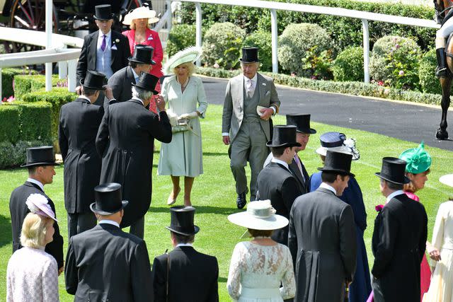 <p>Kirstin Sinclair/Getty </p> King Charles III and Queen Camilla attend day three of Royal Ascot 2023