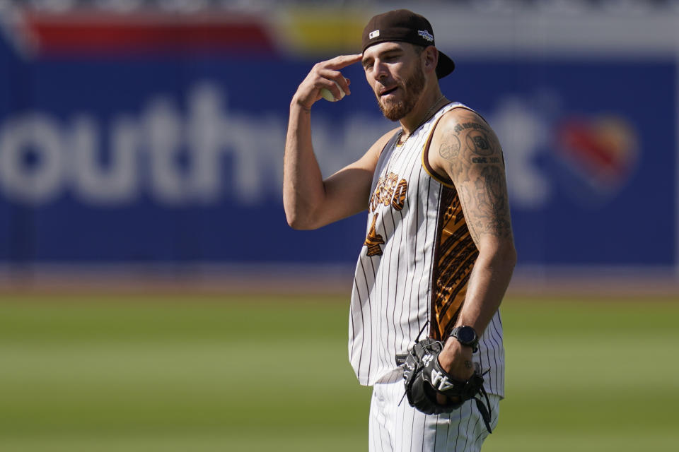 San Diego Padres pitcher Joe Musgrove jokes with teammates during practice ahead of Game 1 of the baseball NL Championship Series against the Philadelphia Phillies, Monday, Oct. 17, 2022, in San Diego. The Padres host the Phillies for Game 1 Oct. 18. (AP Photo/Gregory Bull)