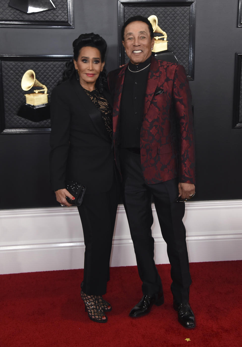 Frances Glandney Robinson, left, and Smokey Robinson arrive at the 62nd annual Grammy Awards at the Staples Center on Sunday, Jan. 26, 2020, in Los Angeles. (Photo by Jordan Strauss/Invision/AP)