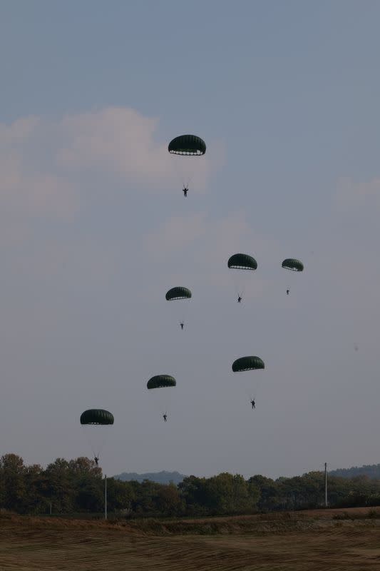 Members of South Korea and U.S. Special forces parachute during a joint military exercise conducted by South Korean and U.S. special forces troops in Gangwon province