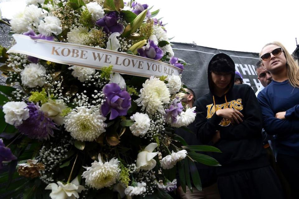 A floral wreath honoring Kobe Bryant appears outside of Staples Center prior to the start of the 62nd annual Grammy Awards, in Los Angeles. Bryant died Sunday in a helicopter crash near Calabasas, Calif. He was 41Kobe Bryant, Los Angeles, USA - 26 Jan 2020