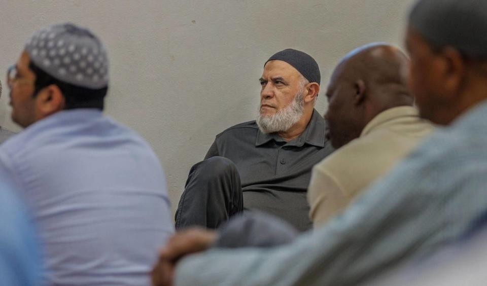 Men listen during the Jumu’Ah prayer service lead by Imam Nasir Ahmad ahead of the Ramadan celebration at Masjid Al-Ansar, in Liberty City, Miami on Friday March 08, 2024.