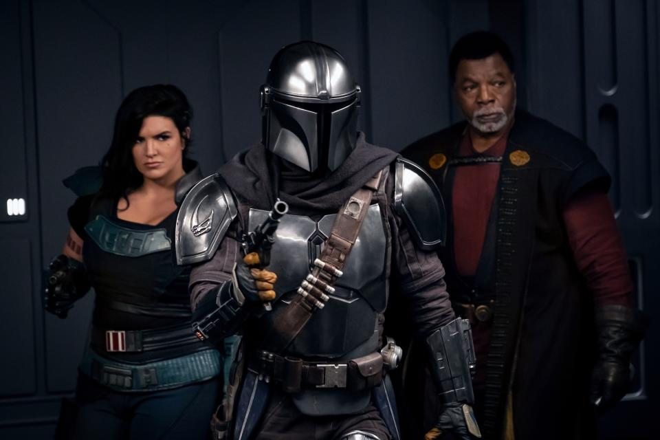 Gina Carano, Pedro Pascal and Carl Weathers in a still from The Mandalorian S2. (Disney+)