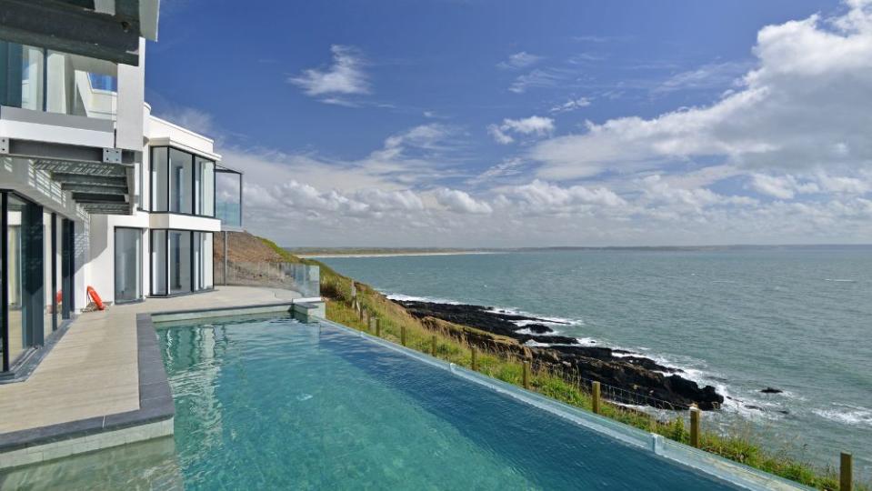 An infinity pool overlooks the Atlantic Ocean. - Credit: Knight Frank