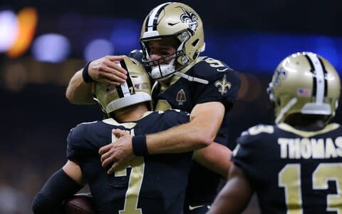 Drew Brees #9 of the New Orleans Saints and Taysom Hill #7 celebrate a touchdown during the second half of a game against the Houston Texans at the Mercedes Benz Superdome on September 09, 2019 in New Orleans, Louisiana - Credit: Getty Images