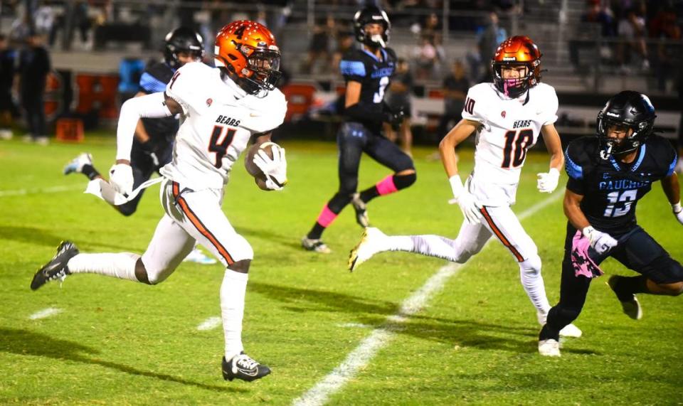 Merced High School senior Chase Smith (4) breaks free for a 68-yard touchdown during a 56-7 win over El Capitan on Friday, Oct. 6, 2023 at Cathie Hostetler Stadium.