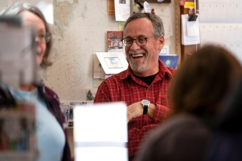 Novel Bay Booksellers co-owner John Maggitti laughs with customers, Tuesday, April 19, at Novel Bay Booksellers in Sturgeon Bay, Wis. Samantha Madar/USA TODAY NETWORK-Wisconsin