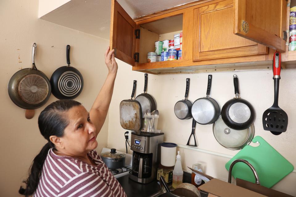 Monthly boxes of food from Hunger Task Force fill a crucial gap in Juana Artiza's nutrition. The federally funded boxes are delivered to her home by a DoorDash delivery driver. She is one of about 1,500 Milwaukee-area residents age 60 and up who use the delivery program.
