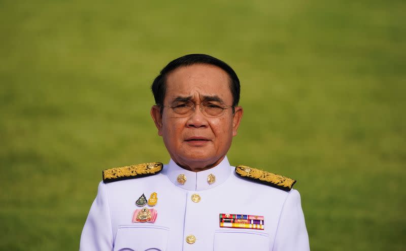 Thailand's Prime Minister Prayuth Chan-ocha attends a family photo session with new cabinet ministers at the Government House in Bangkok