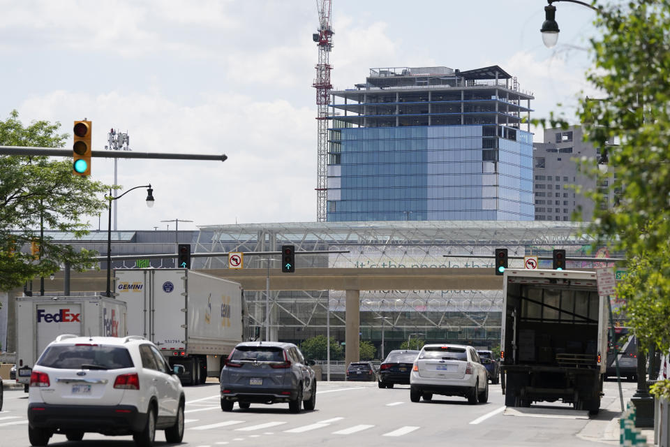 A new high-rise apartment complex that's taking shape on the site of the former Joe Louis Arena is seen Friday, July 7, 2023, in Detroit. On July 18, 2013, a state-appointed manager made Detroit the largest U.S. city to file for bankruptcy. A decade later, the Motor City has risen from the ashes of insolvency, with balanced budgets, revenue increases and millions of dollars socked away. (AP Photo/Carlos Osorio)