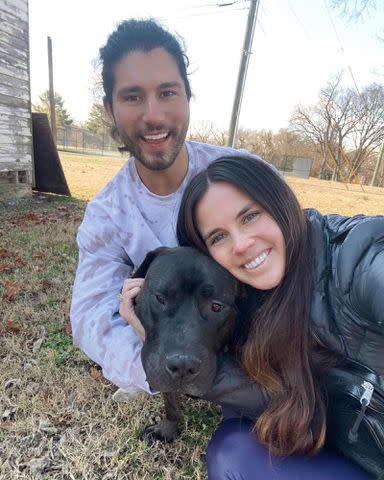 <p>Abby Smyers Instagram</p> Dan Smyers with his wife, Abby Smyers, playing outside with a dog