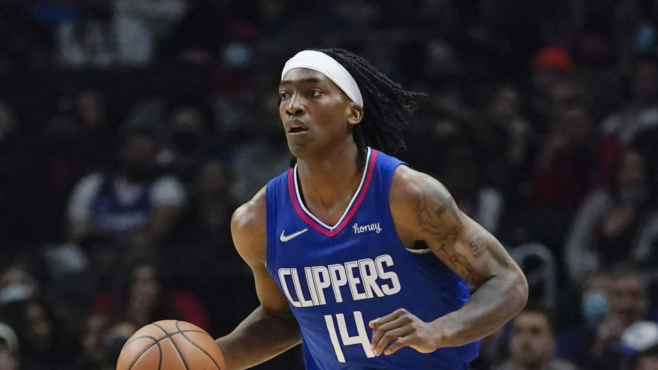 Clippers guard Terance Mann (14) had a chance to make Clippers bettors very happy. (AP Photo/Ashley Landis)