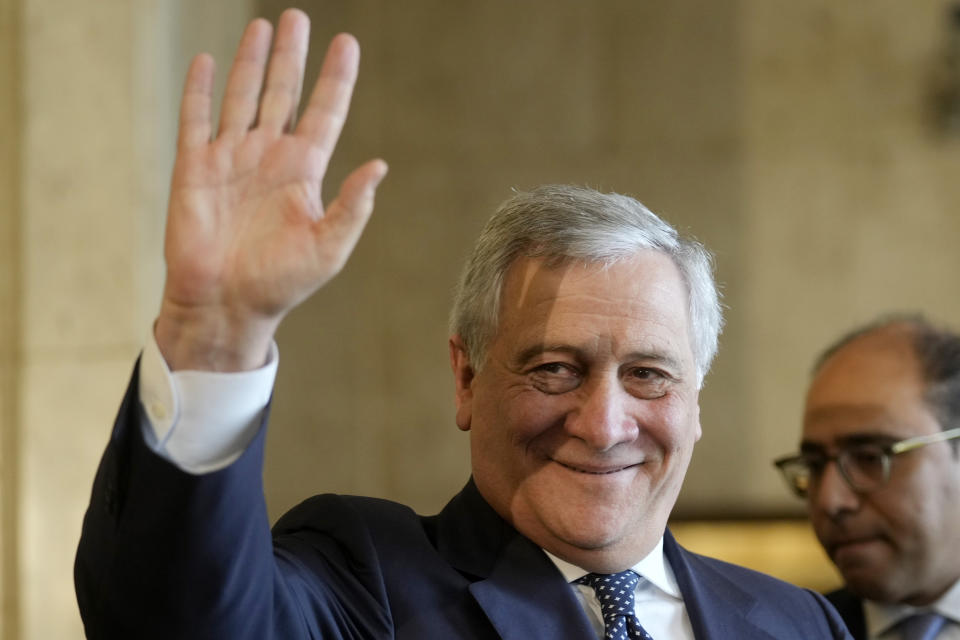 Italian Foreign Minister Antonio Tajani greets reporters as he leaves a press conference with Egyptian counterpart Sameh Shoukry at the foreign ministry headquarters in Cairo, Egypt, Sunday, Jan. 22, 2023. (AP Photo/Amr Nabil)