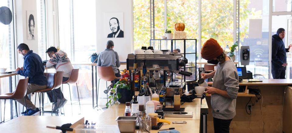 Lindsey Eisenmann makes a drink at Culture Coffee, 1029 NE 6th St, during Small Business Saturday, November 27, 2021.