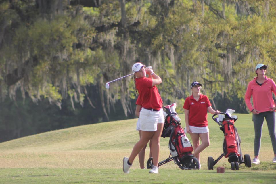 Savannah Christian's Mary Miller follows through on a tee shot on the ninth hole at Bacon Park GC in the Savannah High School City Championship on April 2, 2024