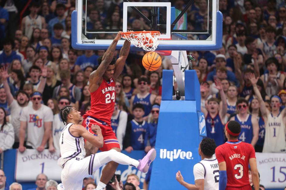 Kansas basketball forward KJ Adams Jr. (24) dunks against Kansas State during the second half of the Sunflower Showdown game inside Allen Fieldhouse on March 5, 2024.