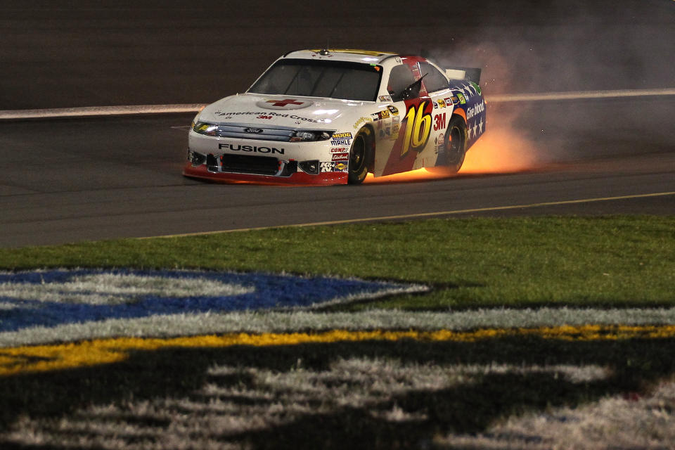 CHARLOTTE, NC - MAY 19: Greg Biffle blows the engine of the #16 3M/American Red Cross Ford during the NASCAR Sprint All-Star Race at Charlotte Motor Speedway on May 19, 2012 in Charlotte, North Carolina. (Photo by Scott Halleran/Getty Images for NASCAR)