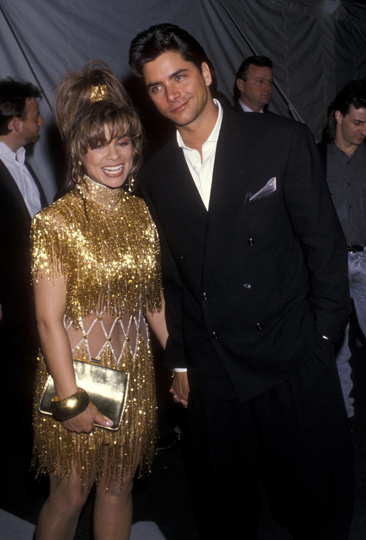 LOS ANGELES - FEBRUARY 21:   Singer Paula Abdul and actor John Stamos attend the 32nd Annual Grammy Awards on February 21, 1990 at the Shrine Auditorium in Los Angeles, California. (Photo by Ron Galella, Ltd./Ron Galella Collection via Getty Images) 