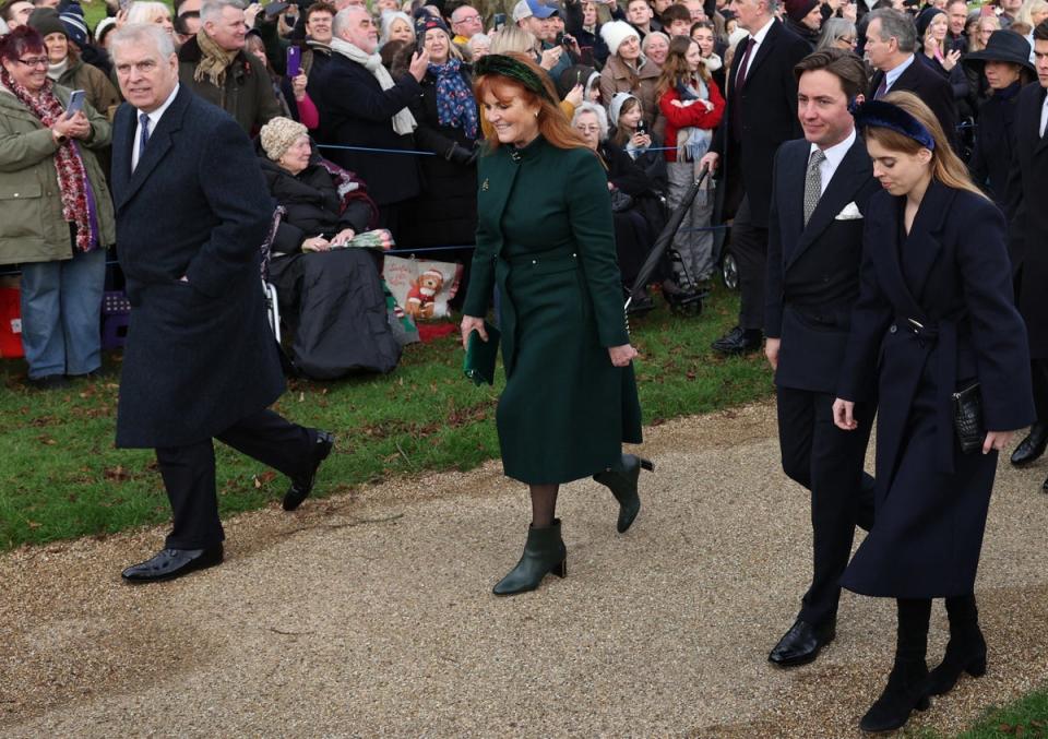 Prince Andrew, Duke of York (L), Sarah, Duchess of York (2L) Edoardo Mapelli Mozzi (2R) and Britain's Princess Beatrice of York (R) arrive for the Royal Family's traditional Christmas Day service at St Mary Magdalene Church in Sandringham in eastern England (AFP via Getty Images)