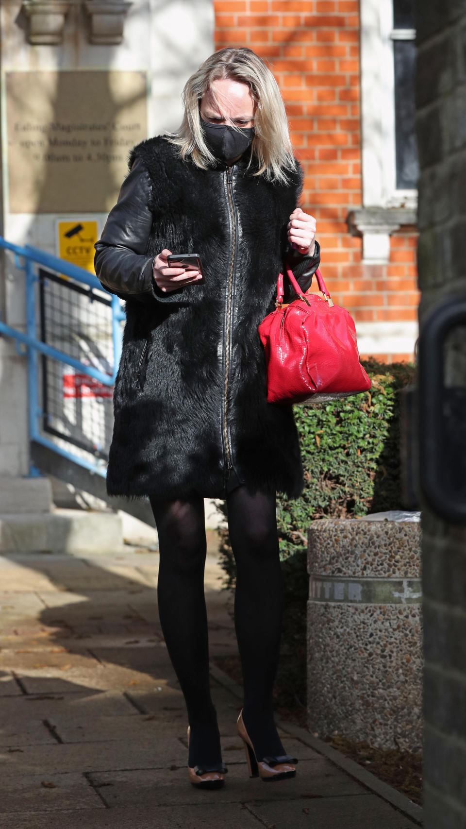 Rachel Street leaves Ealing Magistrates Court in London charged with being drunk in an aircraft during a Virgin Atlantic flight from Barbados to Heathrow in January. Picture date: Wednesday March 17, 2021.