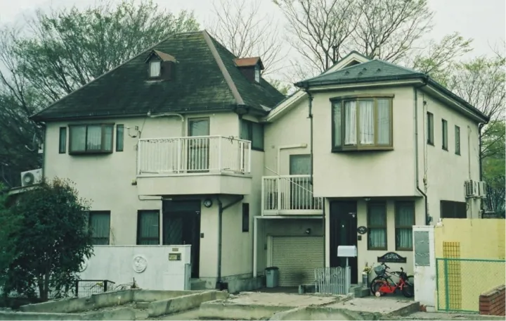 The Miyazawas' house is on the right; Yasuko’s family lived in the house next door.