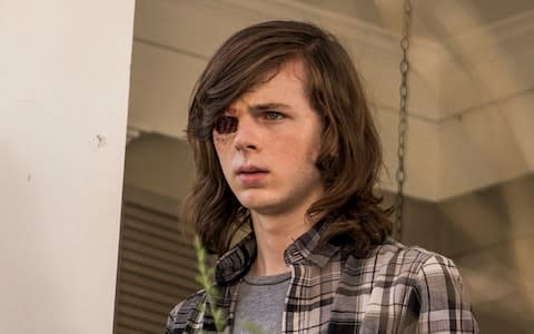 Chandler Riggs as Carl in The Walking Dead - Credit: AMC