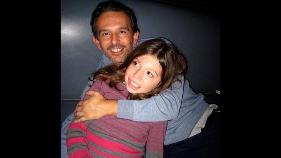 Camilo Salazar in an undated photo with his daughter. Salazar was murdered in Miami-Dade in June 2011.