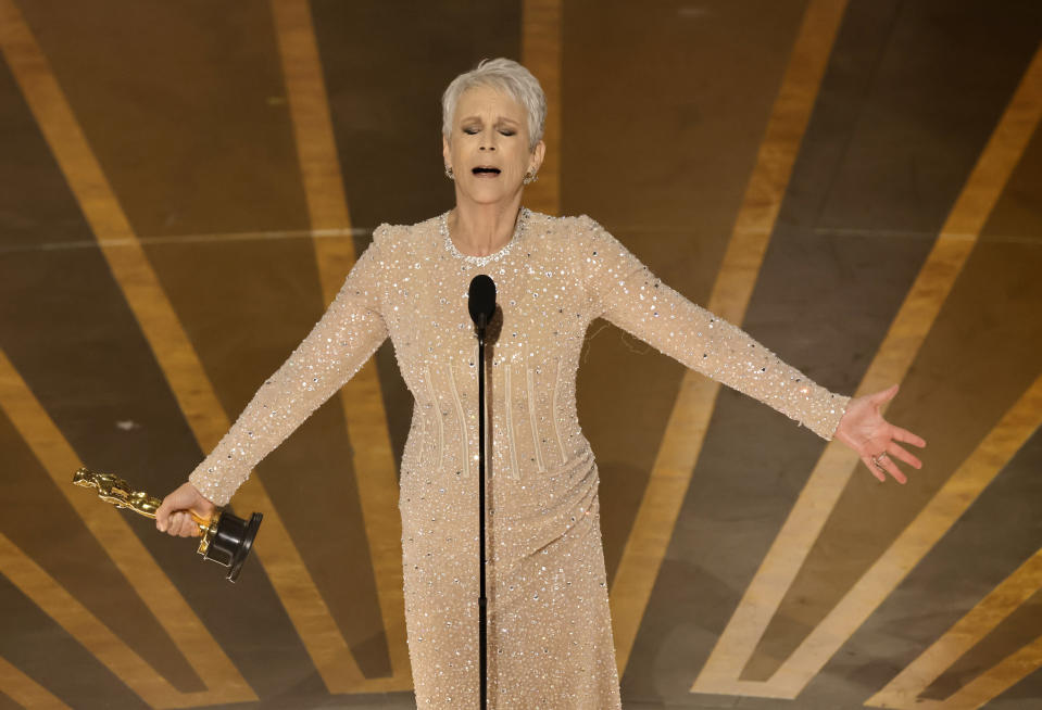 Jamie Lee Curtis accepts the Best Supporting Actress for Everything Everywhere All at Once onstage during the Academy Awards on March 12.
