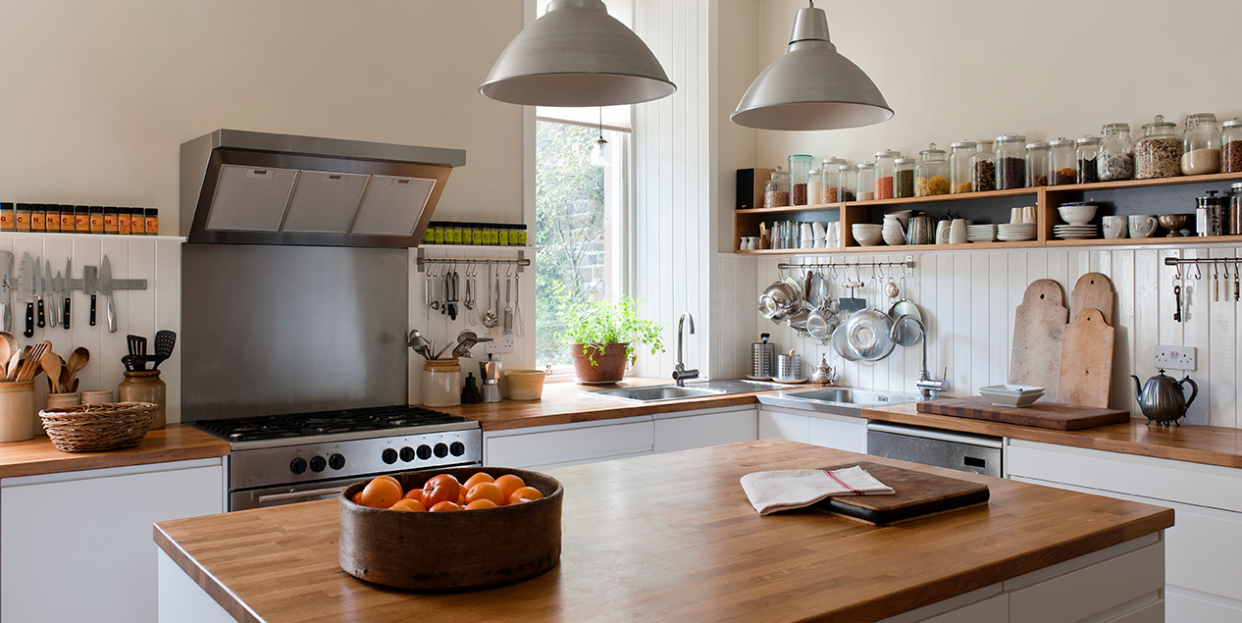 a kitchen with wood countertops