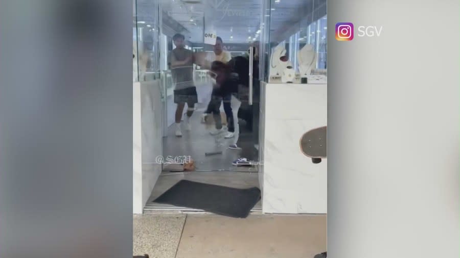 Video: employees fight back against robbery suspect who sprayed them with bear repellent