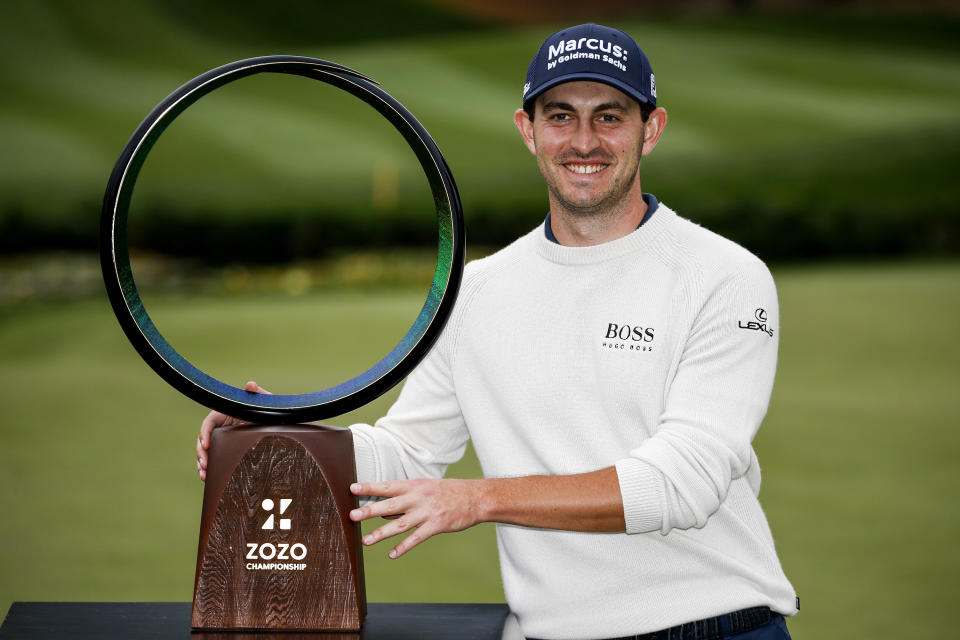 Patrick Cantlay poses with his trophy after winning the Zozo Championship golf tournament Sunday, Oct. 25, 2020, in Thousand Oaks, Calif. (AP Photo/Ringo H.W. Chiu)