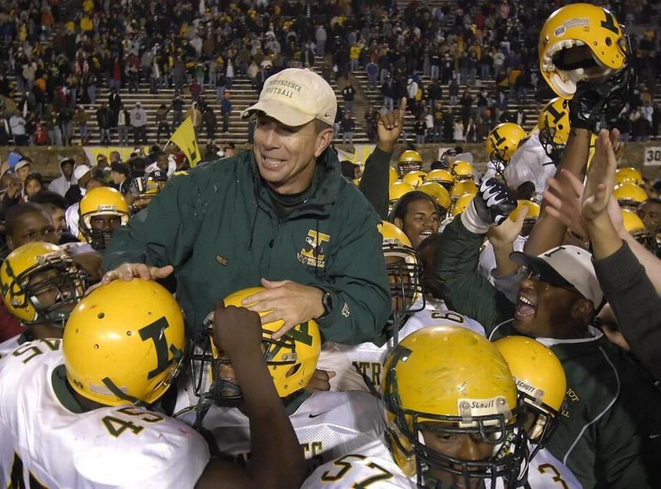 Former Independence High football coach Tom Knotts is shown here in November 2007 after the Patriots beat arch-rival Butler for the Southwestern 4A conference championship.