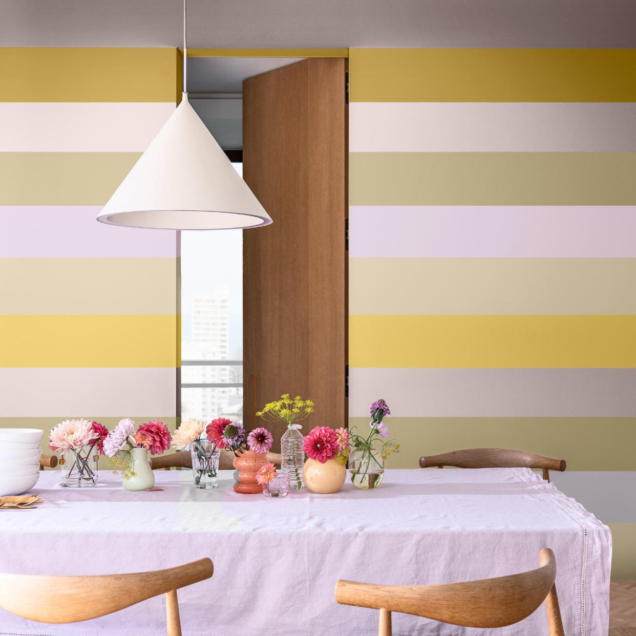  A dining room with painted stripes. 