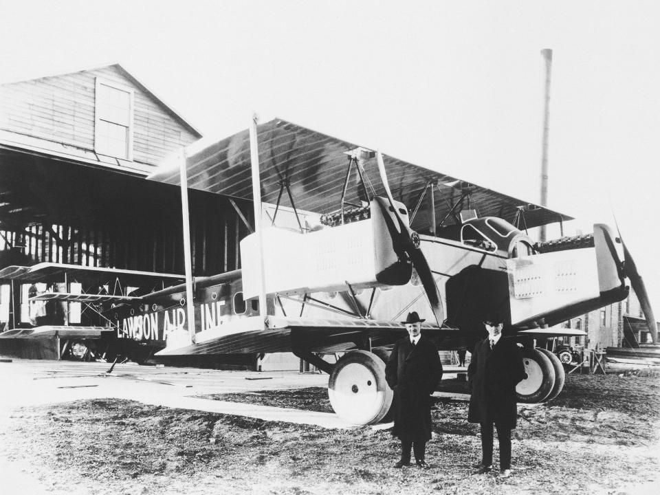 Alfred W. Lawson with a passenger airplane in 1920