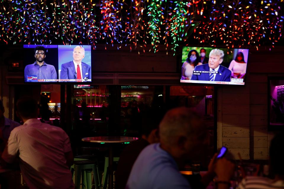 The dual town halls of Biden and Trump seen on television in Tampa, FloridaREUTERS