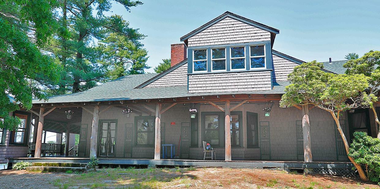 The Needles Lodge at Camp Kiwanee in Hanson overlooks Maquan Pond.