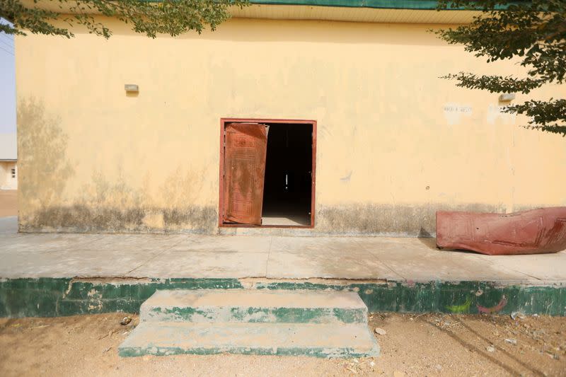 A door leave is seen laid aside a day after over 300 school girls were abducted by bandits away from the JSS school in Zamfara