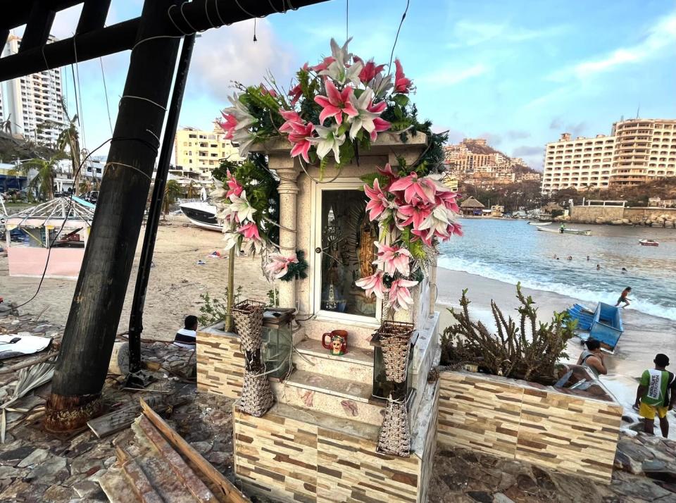 A Virgen of Guadelupe shrine on a bridge.