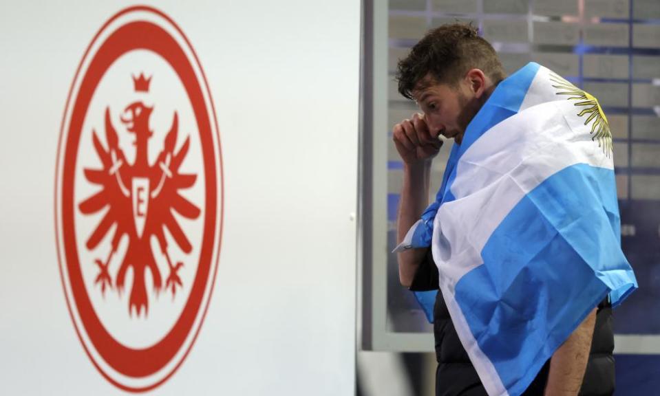 The Argentinian defender David Abraham appears to wipe away a tear as he leaves the pitch at Deutsche Bank Park for the final time.