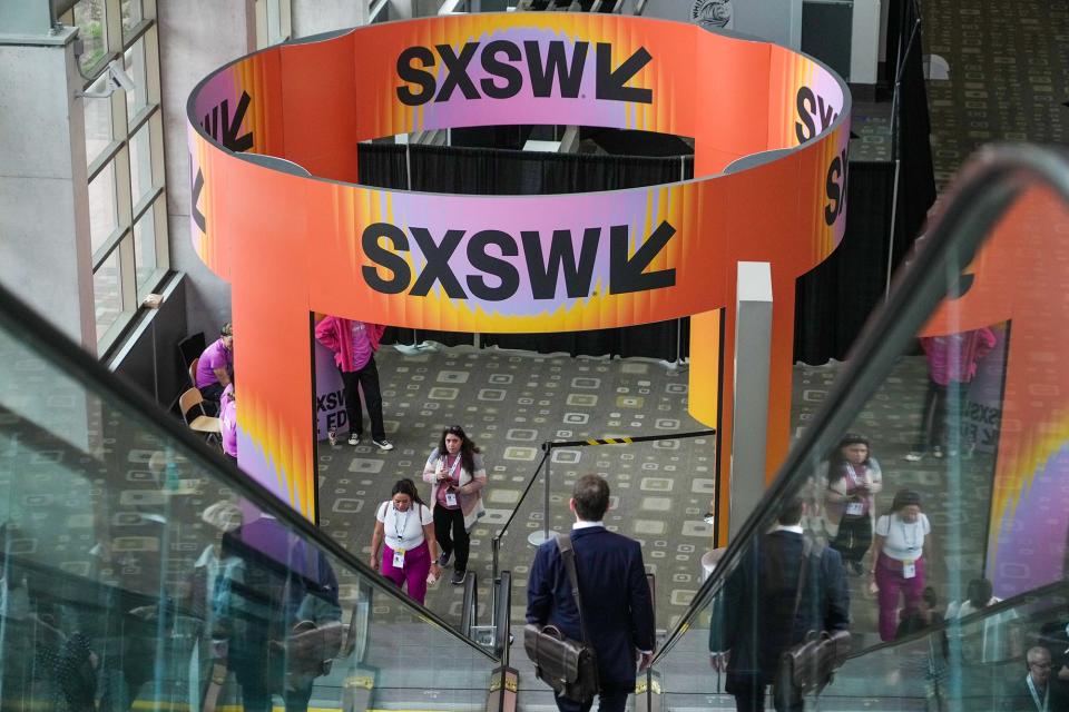 SXSW attendees arrive at the Austin Convention Center to register and pick up their badges.