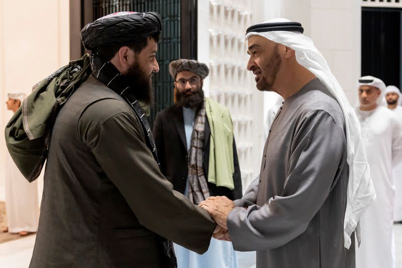 President of the UAE Sheikh Mohamed bin Zayed Al Nahyan bids farewell to Afghanistan's Acting Defence Minister Mullah Mohammad Yaqoob at Al-Shati Palace in Abu Dhabi