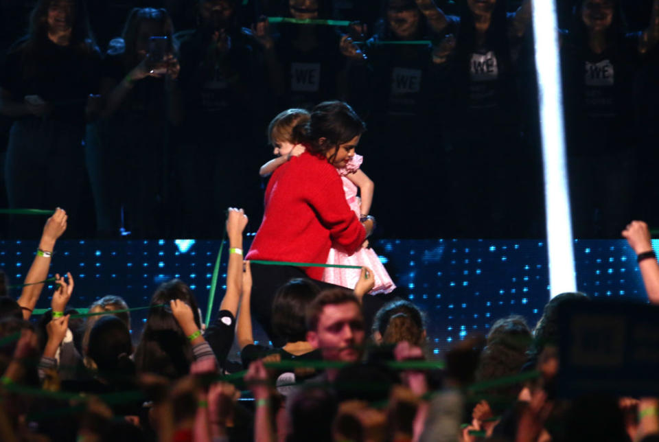 Selena Gomez hugs Nellie Mainor onstage at WE Day California on April 19, 2018, in Inglewood, Calif. (Photo: Tommaso Boddi/Getty Images for WE) 
