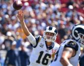 Sep 23, 2018; Los Angeles, CA, USA; Los Angeles Rams quarterback Jared Goff (16) throws a pass in the first quarter against the Los Angeles Chargers at Los Angeles Memorial Coliseum. Mandatory Credit: Robert Hanashiro-USA TODAY Sports