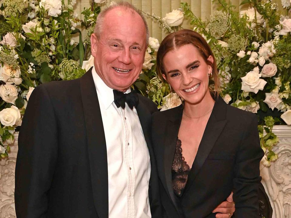 <p>David M. Benett/Dave Benett/Getty</p> Emma Watson and her dad Chris Watson attend the British Vogue and Tiffany & Co. Fashion and Film Party in March 2022 in London, England.