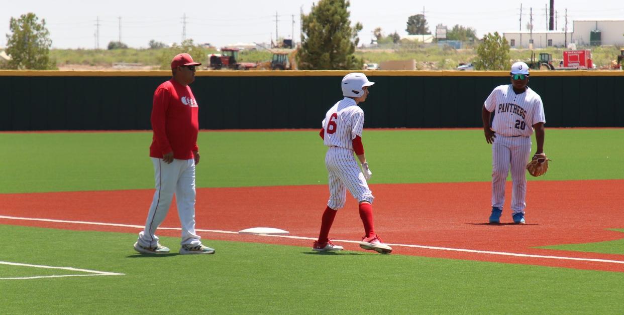 Loving's Gio Ruiz leads off third base during an April 27, 2024 baseball game against Jal.