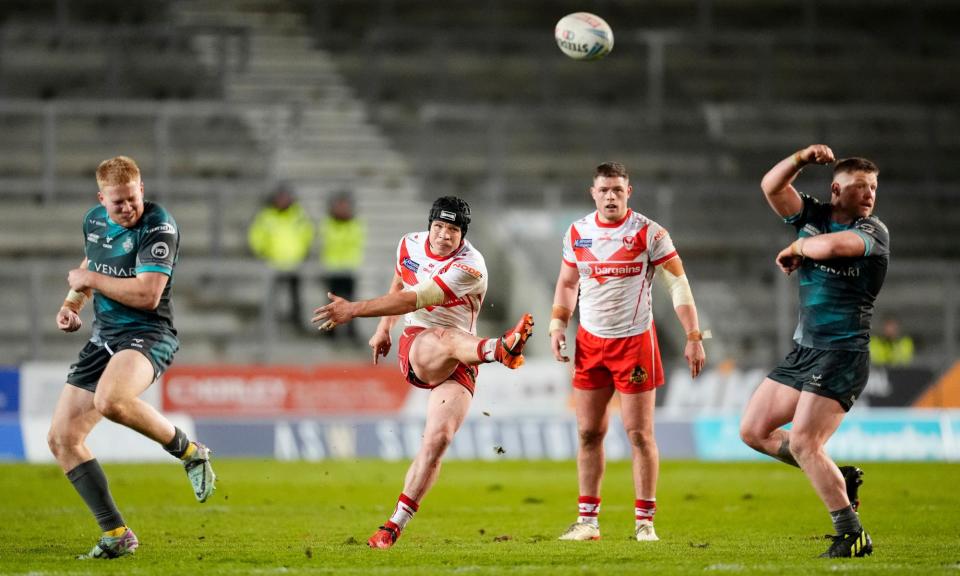 <span>Jonny Lomax decides the game with a last-minute drop goal.</span><span>Photograph: Nick Potts/PA</span>